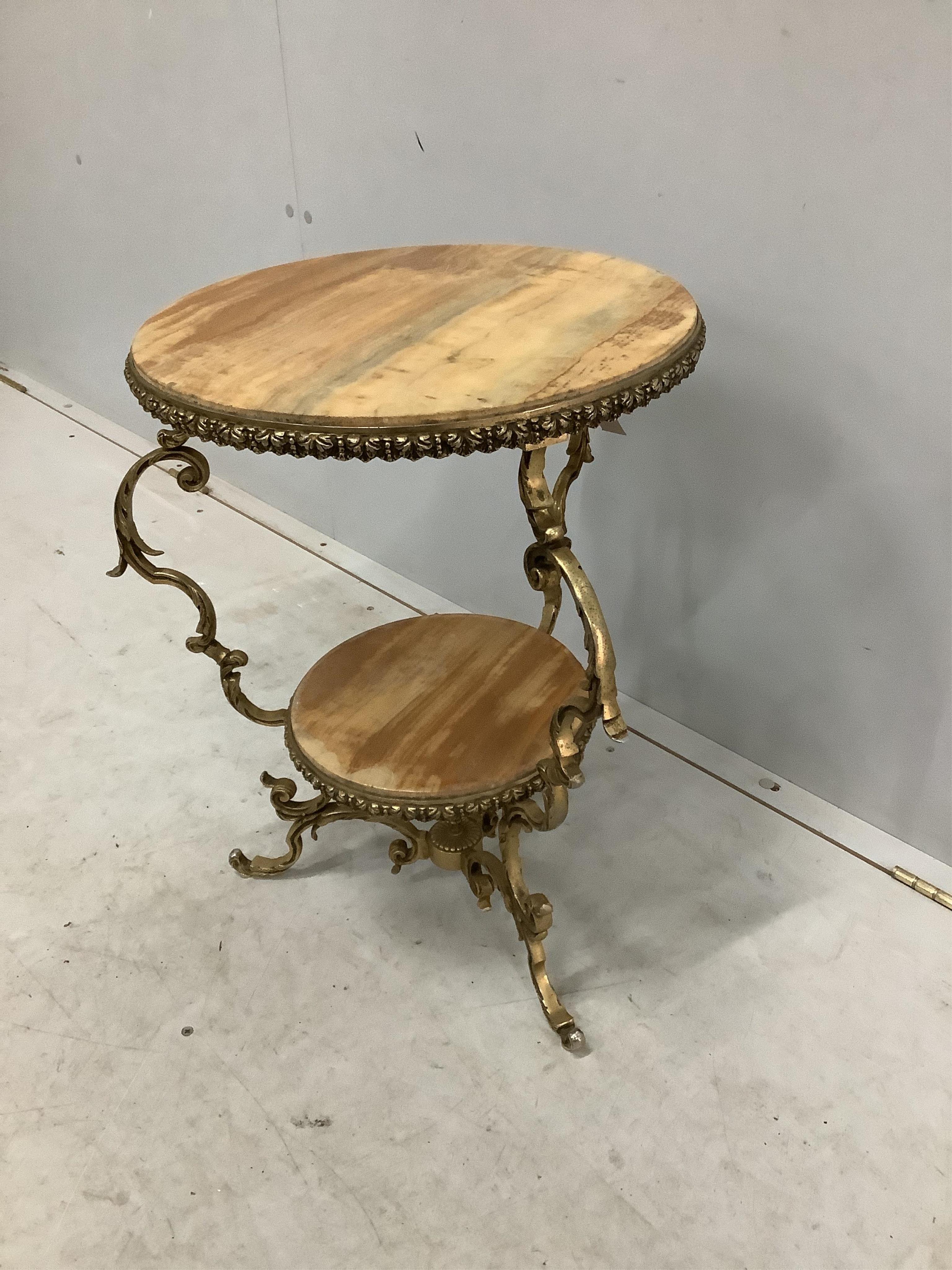 A gilt metal and onyx two tier occasional table, diameter 48cm, height 55cm. Condition - fair